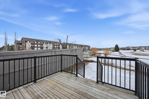 Wooden deck with a residential view - 1349 Cunningham Drive, Edmonton, AB - Outdoor
