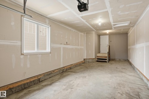 Garage featuring a garage door opener - 1351 Cunningham Drive, Edmonton, AB - Indoor