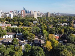 View of city with a tree filled landscape - 