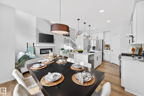 324 Stiles Way, Leduc, AB - Indoor With Fireplace