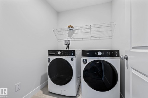 144 Honeysuckle Green, Leduc, AB - Indoor Photo Showing Laundry Room