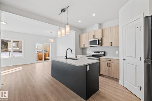 144 Honeysuckle Green, Leduc, AB - Indoor Photo Showing Kitchen With Upgraded Kitchen