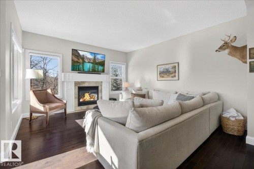 1440 Chahley Place, Edmonton, AB - Indoor Photo Showing Living Room With Fireplace