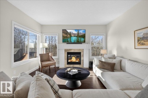 1440 Chahley Place, Edmonton, AB - Indoor Photo Showing Living Room With Fireplace