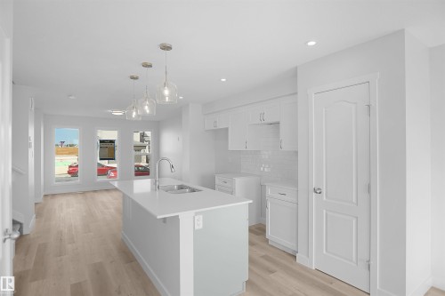 22935 82 Avenue, Edmonton, AB - Indoor Photo Showing Kitchen With Double Sink With Upgraded Kitchen