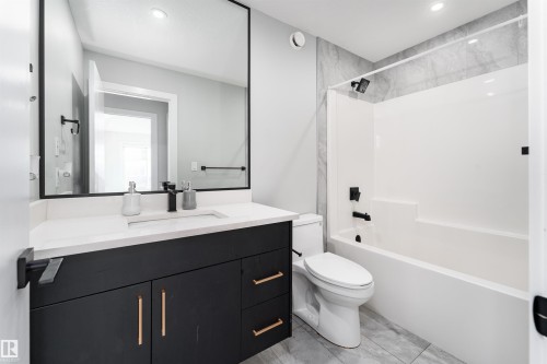Full bath with vanity, washtub / shower combination, and recessed lighting - 5211 Kimball Crescent, Edmonton, AB - Indoor Photo Showing Bathroom