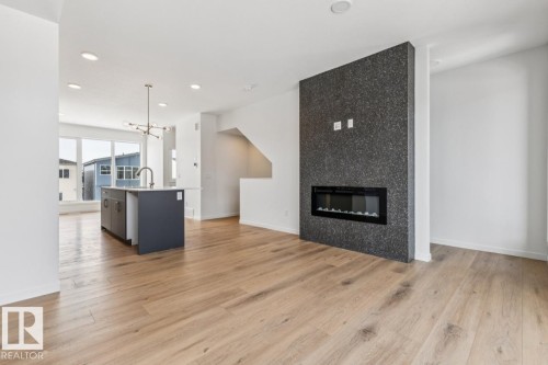 2618 Alces Way, Edmonton, AB - Indoor Photo Showing Other Room With Fireplace