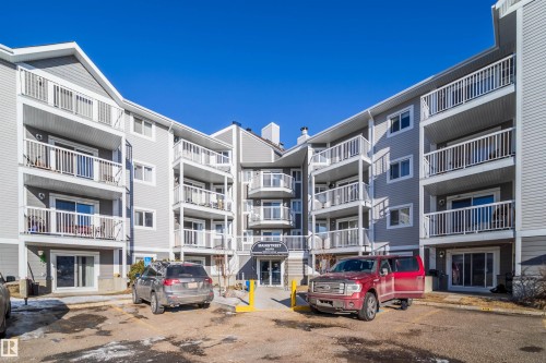 View of apartment building / complex with uncovered parking - 213 5065 31 Avenue, Edmonton, AB - Outdoor With Facade
