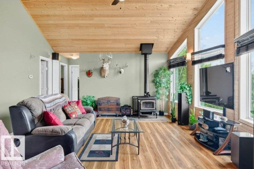 129 50529 Rge Road 21, Rural Parkland County, AB - Indoor Photo Showing Living Room With Fireplace