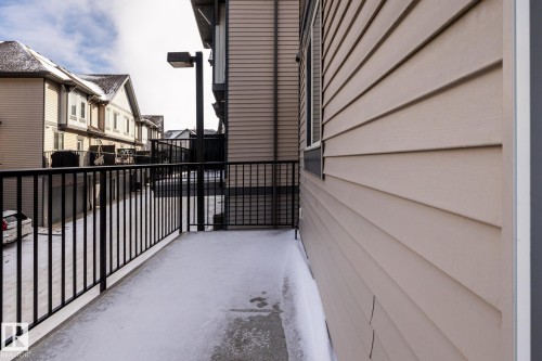Balcony with a residential view - 21 655 Watt Boulevard, Edmonton, AB - Outdoor With Exterior
