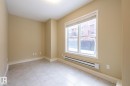 Spare room with a baseboard radiator and baseboards - 21 655 Watt Boulevard, Edmonton, AB  - Indoor Photo Showing Other Room 