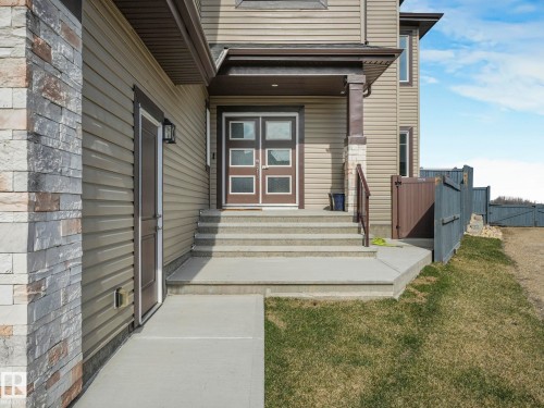 View of exterior entry featuring a gate - 1104 152 Avenue, Edmonton, AB - Outdoor With Exterior