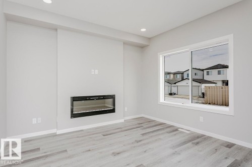 18129 73A Street, Edmonton, AB - Indoor Photo Showing Other Room With Fireplace