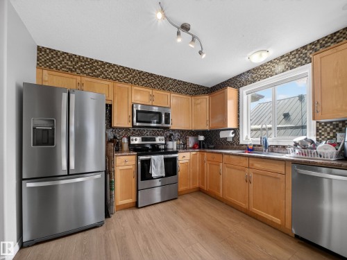 11933 77 Street, Edmonton, AB - Indoor Photo Showing Kitchen With Double Sink