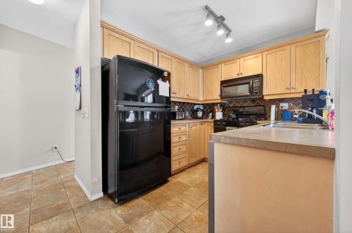 157 230 Edwards Drive, Edmonton, AB - Indoor Photo Showing Kitchen With Double Sink