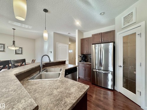 29 Heron Crescent, Spruce Grove, AB - Indoor Photo Showing Kitchen With Stainless Steel Kitchen With Double Sink