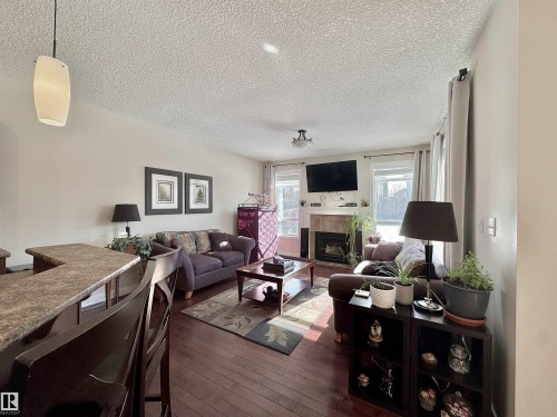 29 Heron Crescent, Spruce Grove, AB - Indoor Photo Showing Living Room With Fireplace