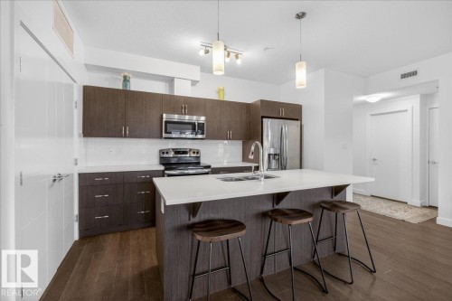 406 8525 91 Street, Edmonton, AB - Indoor Photo Showing Kitchen With Stainless Steel Kitchen With Double Sink With Upgraded Kitchen