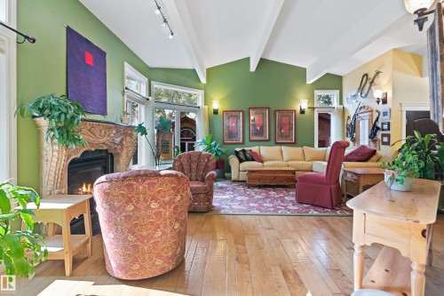 5704 144 Street, Edmonton, AB - Indoor Photo Showing Living Room With Fireplace