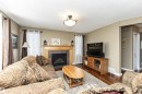 19047 51 Avenue, Edmonton, AB  - Indoor Photo Showing Living Room With Fireplace 