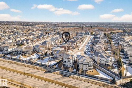 Aerial perspective of suburban area - 1660 Malone Way, Edmonton, AB - Outdoor With View