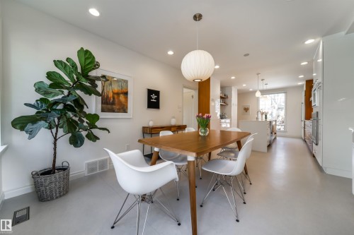 Dining room with recessed lighting and finished concrete flooring - 10445 134 Street, Edmonton, AB - Indoor Photo Showing Dining Room