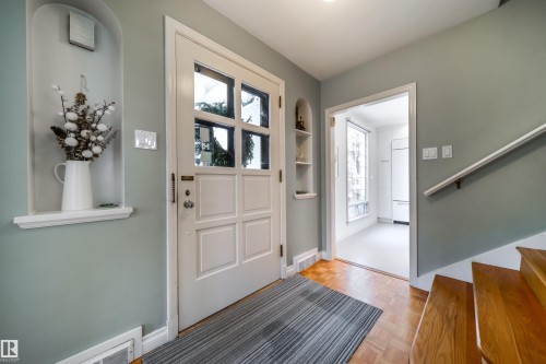 Entryway featuring parquet floors and stairs - 10445 134 Street, Edmonton, AB - Indoor Photo Showing Other Room