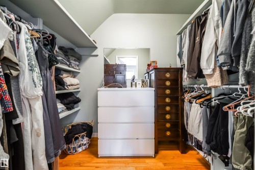Walk in closet with light wood-style flooring - 10445 134 Street, Edmonton, AB - Indoor With Storage