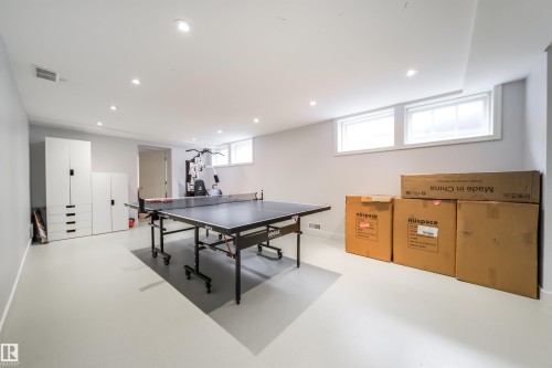 Rec room featuring concrete flooring and recessed lighting - 10445 134 Street, Edmonton, AB - Indoor Photo Showing Other Room