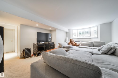 Living room with carpet floors and recessed lighting - 10445 134 Street, Edmonton, AB - Indoor Photo Showing Living Room