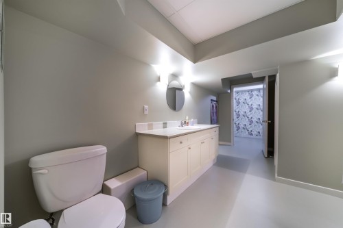 Bathroom featuring vanity and finished concrete floors - 10445 134 Street, Edmonton, AB - Indoor Photo Showing Bathroom
