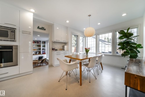 Dining space featuring recessed lighting and concrete flooring - 10445 134 Street, Edmonton, AB - Indoor Photo Showing Other Room