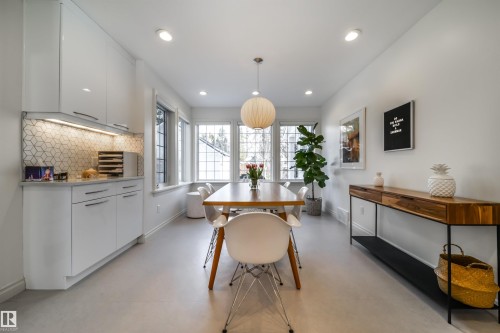 Dining space featuring plenty of natural light, recessed lighting, and concrete flooring - 10445 134 Street, Edmonton, AB - Indoor