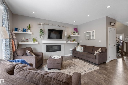 7034 172A Avenue, Edmonton, AB - Indoor Photo Showing Living Room With Fireplace
