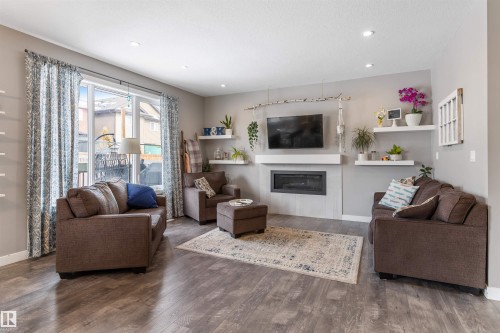 7034 172A Avenue, Edmonton, AB - Indoor Photo Showing Living Room With Fireplace