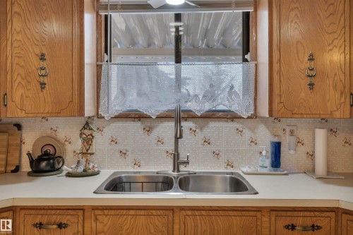63 Alpaugh Crescent, Leduc, AB - Indoor Photo Showing Kitchen With Double Sink