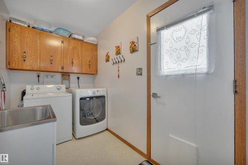 63 Alpaugh Crescent, Leduc, AB - Indoor Photo Showing Laundry Room