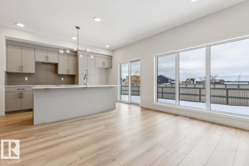 25 Stetson Loop, Ardrossan, AB - Indoor Photo Showing Kitchen With Upgraded Kitchen