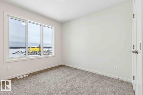 25 Stetson Loop, Ardrossan, AB - Indoor Photo Showing Other Room