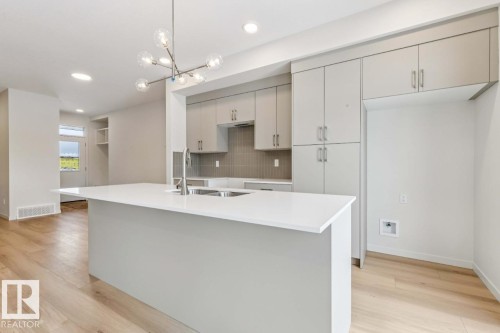 25 Stetson Loop, Ardrossan, AB - Indoor Photo Showing Kitchen With Double Sink