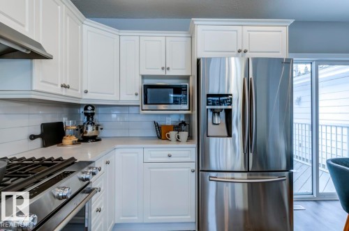 B7 Golden Days, Rural Leduc County, AB - Indoor Photo Showing Kitchen With Stainless Steel Kitchen