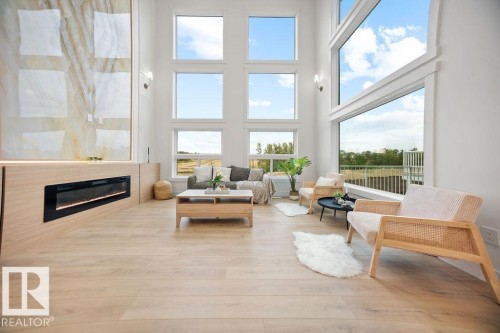 3335 Chickadee Drive, Edmonton, AB - Indoor Photo Showing Living Room With Fireplace