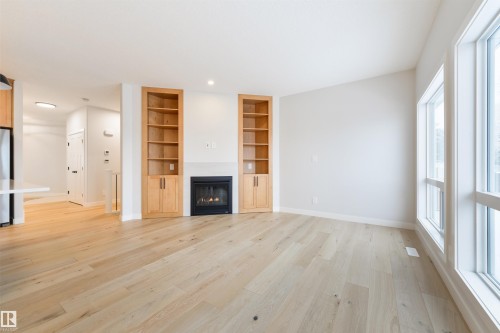 #23 1005 Calahoo Rd, Spruce Grove, AB - Indoor With Fireplace