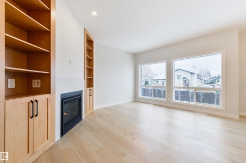#23 1005 Calahoo Rd, Spruce Grove, AB - Indoor With Fireplace