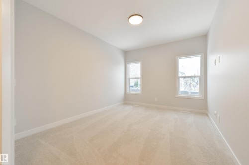 #23 1005 Calahoo Rd, Spruce Grove, AB - Indoor Photo Showing Other Room