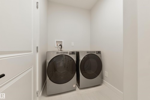 #23 1005 Calahoo Rd, Spruce Grove, AB - Indoor Photo Showing Laundry Room