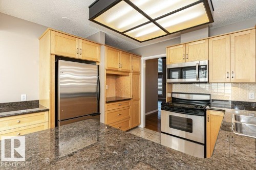 1051 109 Street, Edmonton, AB - Indoor Photo Showing Kitchen With Stainless Steel Kitchen With Double Sink