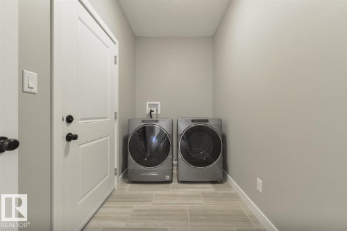 #86 1005 Calahoo Rd, Spruce Grove, AB - Indoor Photo Showing Laundry Room