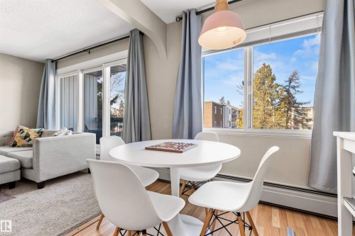 Dining space featuring light wood-style flooring - 304 11420 40 Avenue Nw, Edmonton, AB - Indoor Photo Showing Dining Room