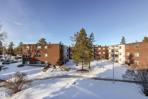 Snow covered building with a view of apartment building / complex - 304 11420 40 Avenue Nw, Edmonton, AB - Outdoor